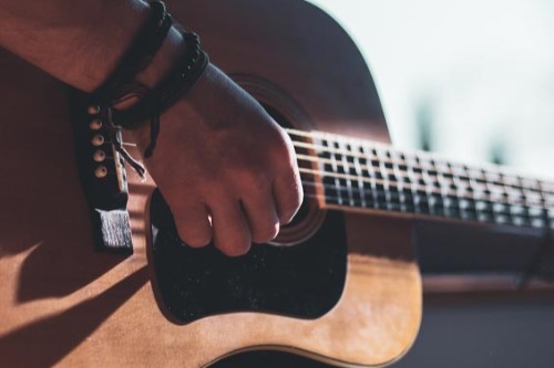 Gitaarles muziekschool Klein